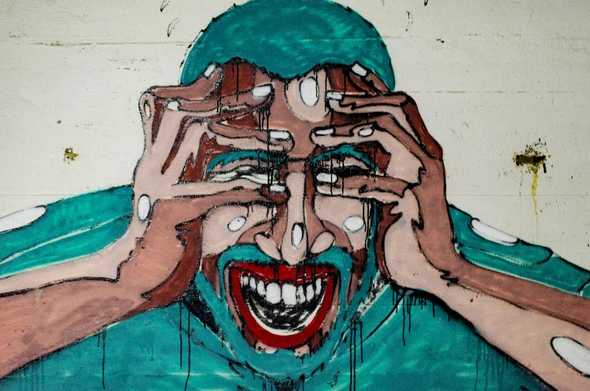 Photo by Aarón Blanco Tejedor of mural of man in pain